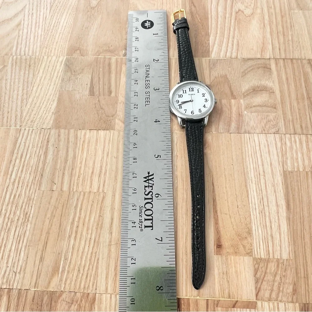 Timex ladies silver tone black leather watch NEW BATTERY
